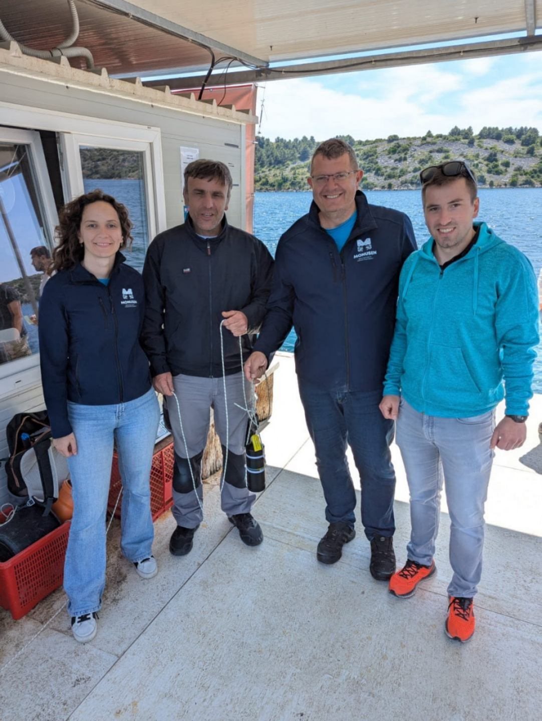 Field team with an acoustic receiver ready for deployment